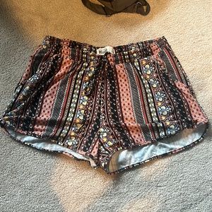 Patterned flowy shorts by Mudd